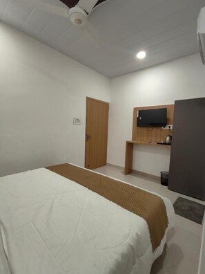 Quarto triplo luxo, vista para a cidade