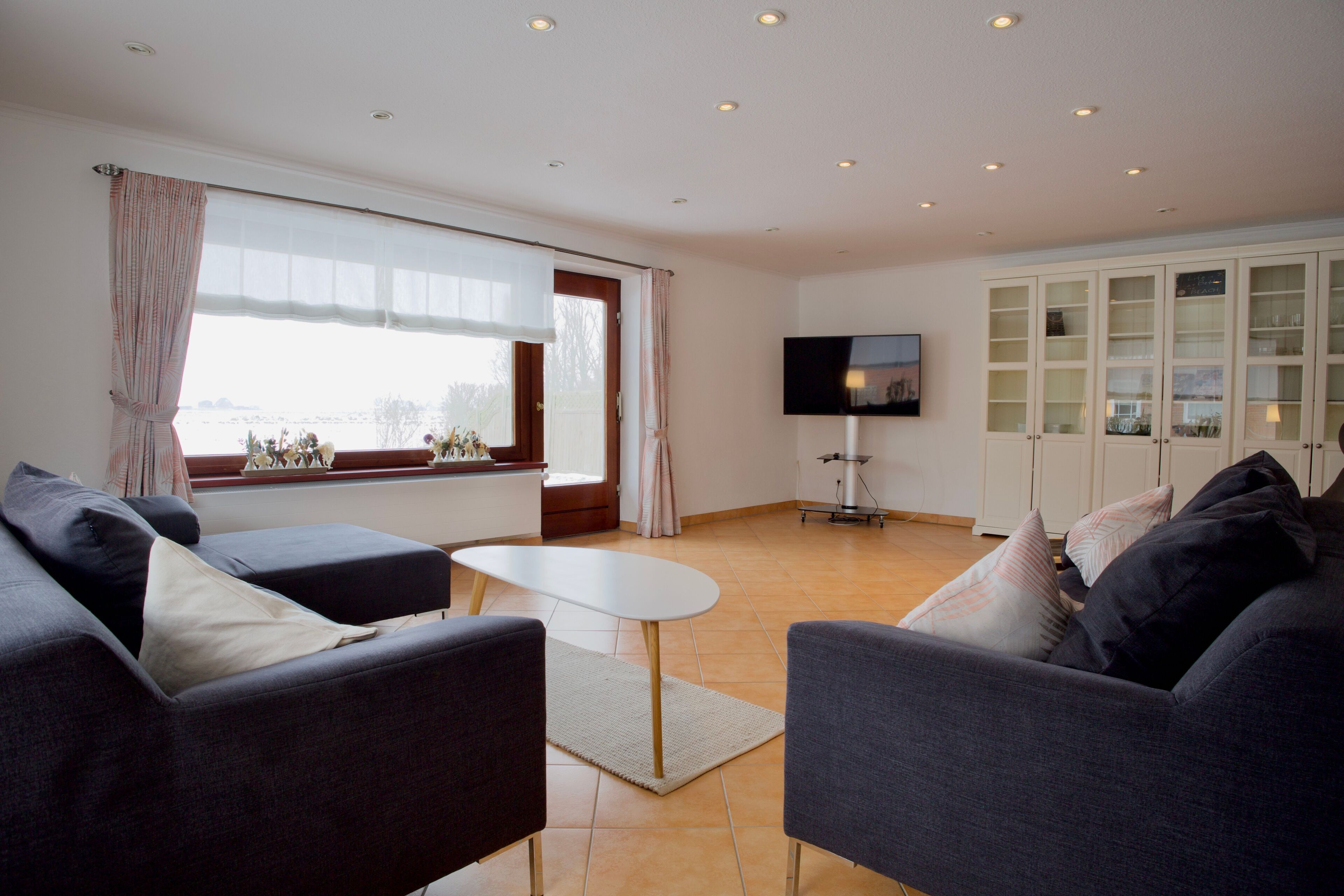 Wohnzimmer mit Gartenzugang