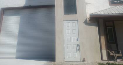 Cozy two bedroom apartment in tranquil The Acreage with refreshing AC