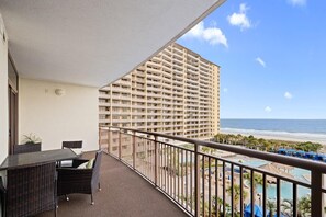Outdoor dining - By the Beachfront Oasis: Luxurious 2BR Oceanfront Condo (North Myrtle Beach)