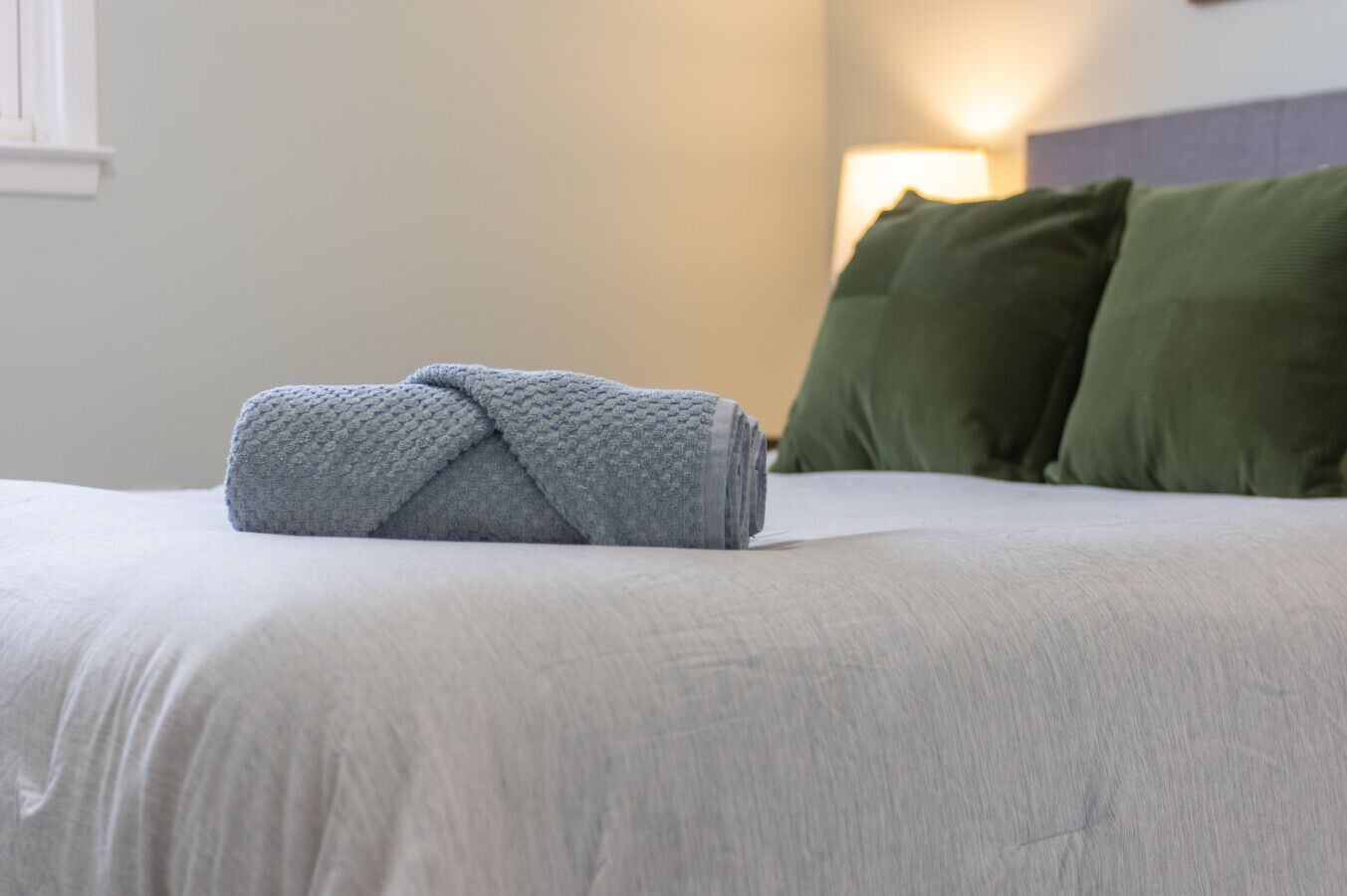 Queen bed detail (fresh linens)