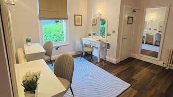 Signature Suite, Patio, Garden View | In-room safe, desk, blackout drapes, iron/ironing board