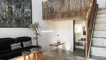 Signature-ullakkohuoneisto, näköala uima-altaalle | Oleskelualue