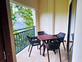 Family Apartment, Balcony, Partial Ocean View | Outdoor dining
