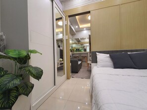 1 bedroom, iron/ironing board, WiFi, bed sheets - VictoriansHome @ The Grass w/ Bridgeway to SM North and access to MRT& Transport (Quezon City)