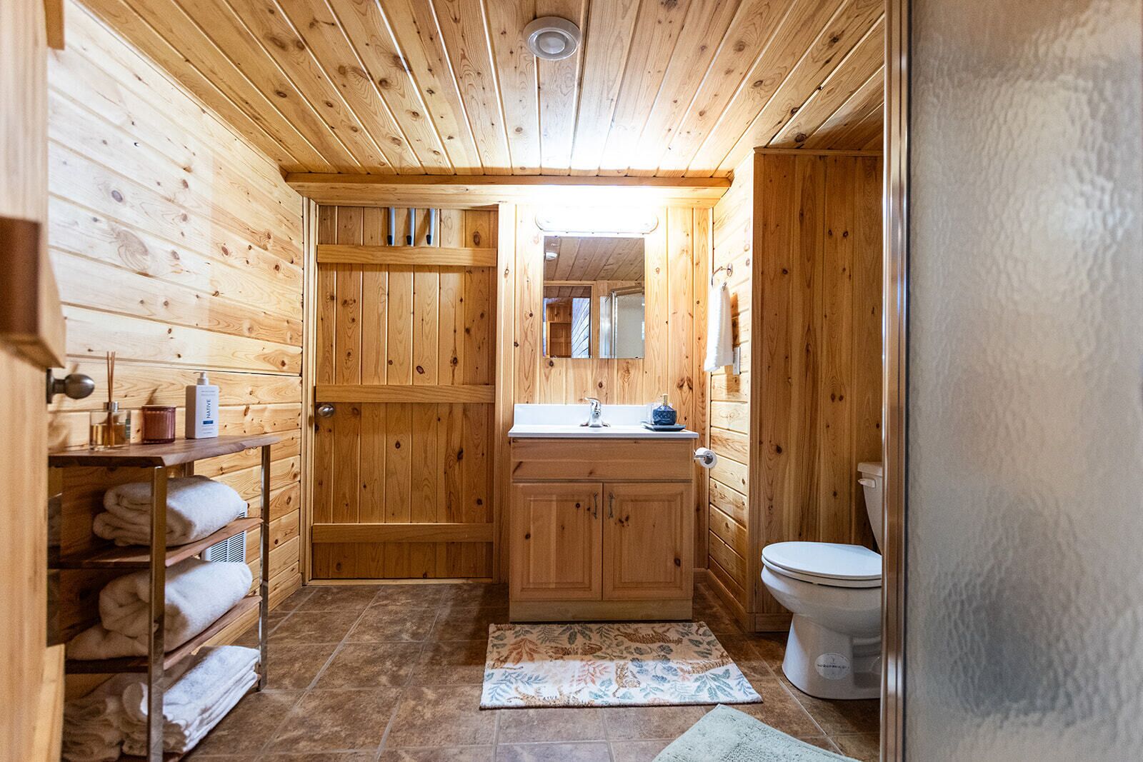 Shower, towels, soap, toilet paper