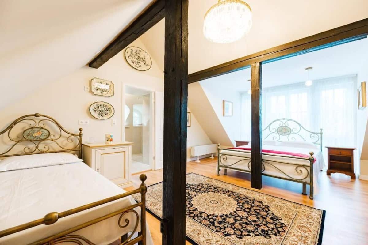 Triple Room, City View | Desk, laptop workspace, iron/ironing board, free WiFi