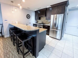 Coffee/tea maker, fridge, microwave, oven - TC Retreat | Beachfront, Heated Outdoor Pool,  Stunning Views (Traverse City)