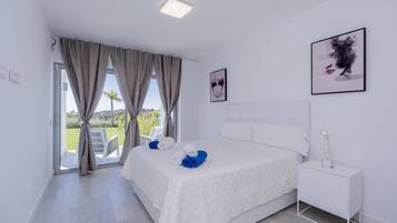 Apartamento | 2 dormitorios y tabla de planchar con plancha