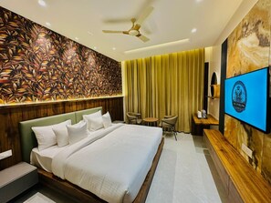 Deluxe Double Room, Pool View | Desk, laptop workspace, iron/ironing board, free WiFi