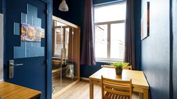 Deluxe Double Room, Canal View | Living area | Smart TV