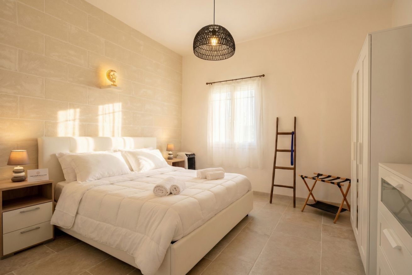 2 bedrooms, iron/ironing board, travel crib