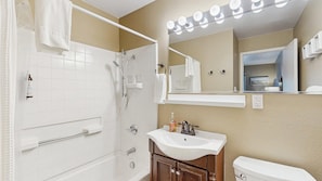 Shower, hair dryer, towels, shampoo