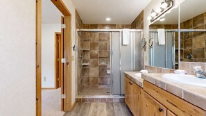 Shower, hair dryer, towels, shampoo