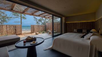 Chambre Double Luxe, patio, vue mer | Coin séjour