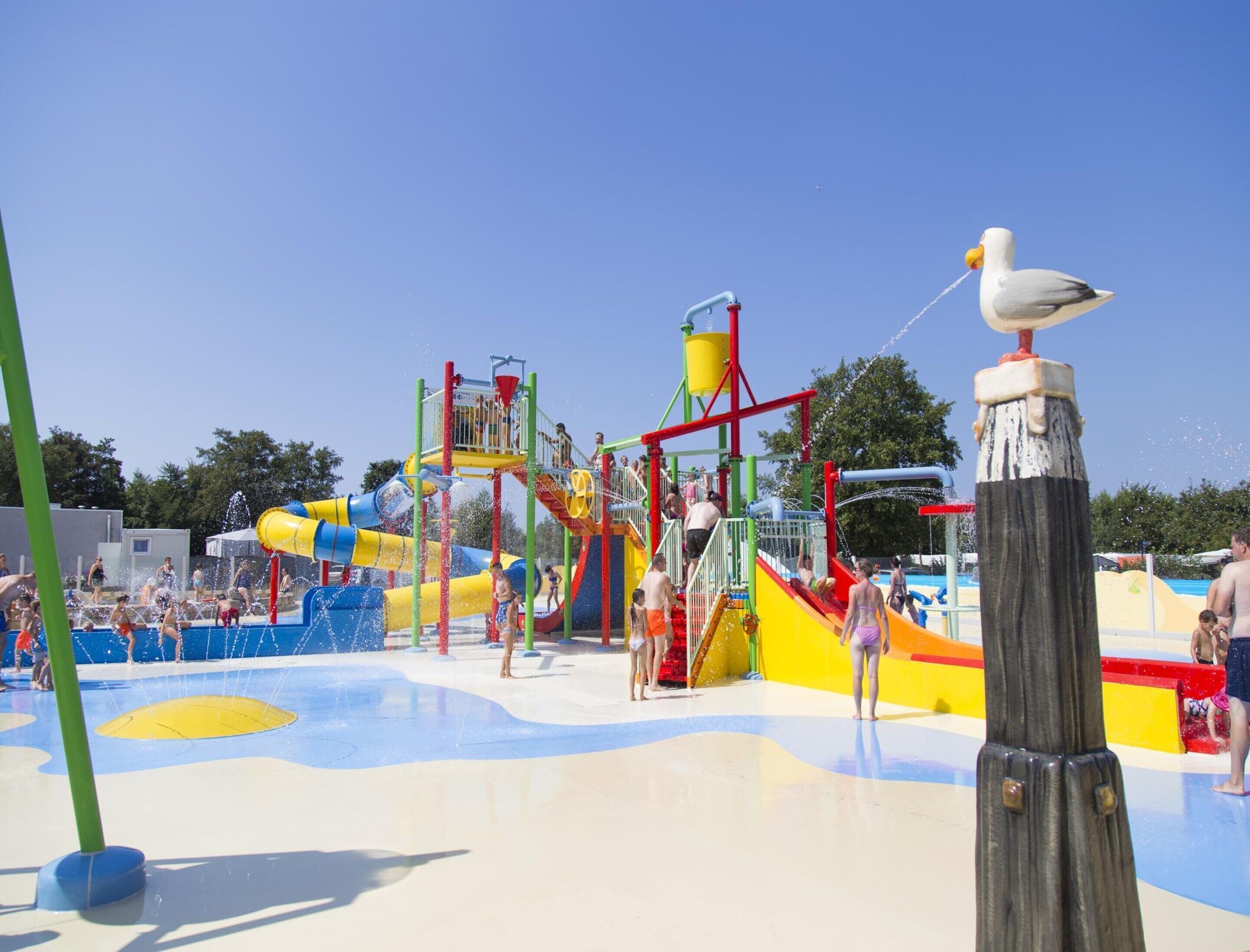 A water park with slides and play structures.