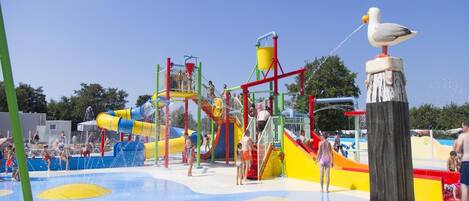 A water park with slides and play structures.