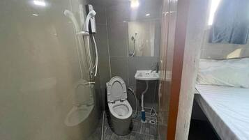 Basic Single Room | Bathroom | Shower, free toiletries, towels, soap