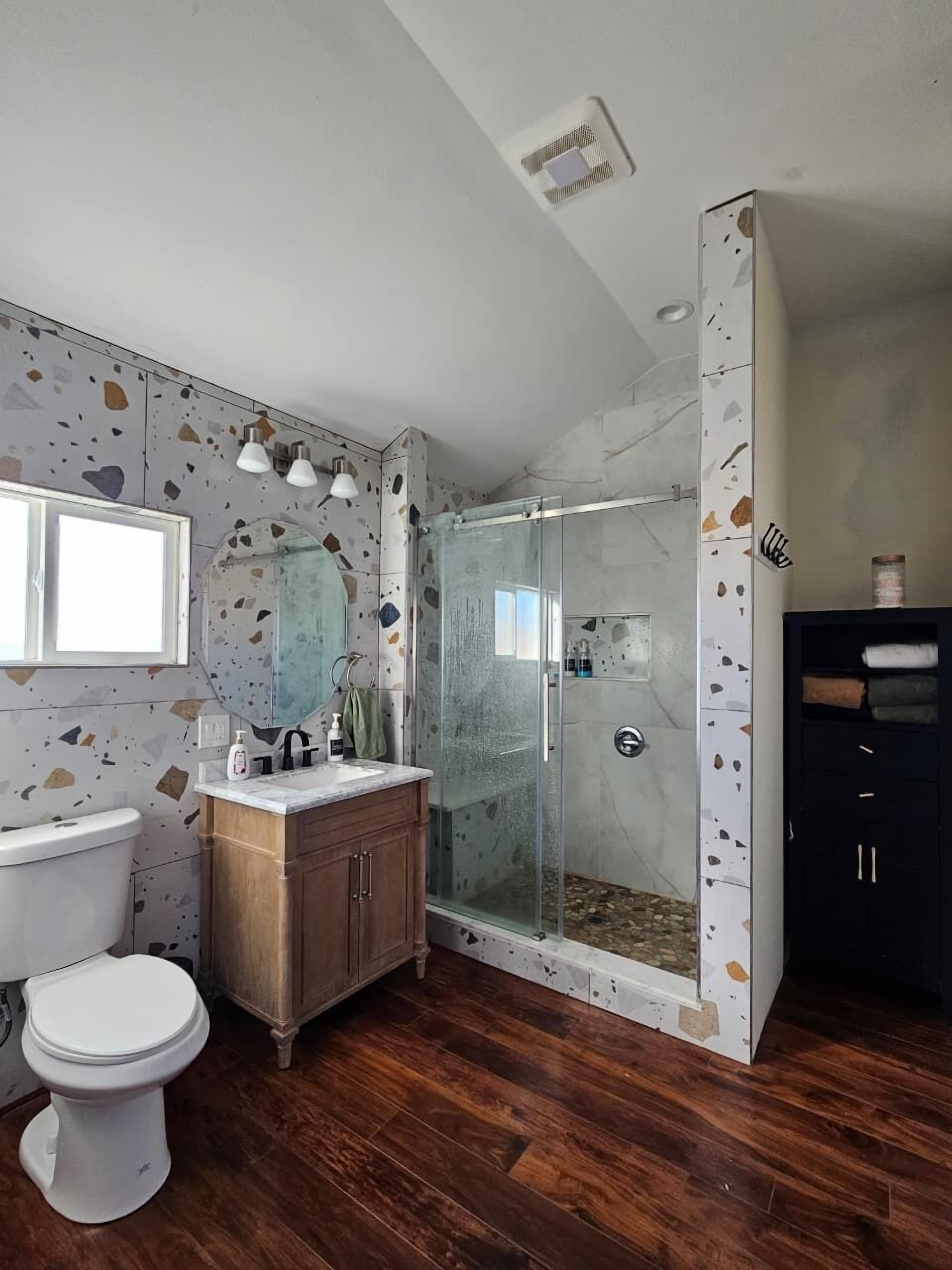 Shower, hair dryer, towels, soap