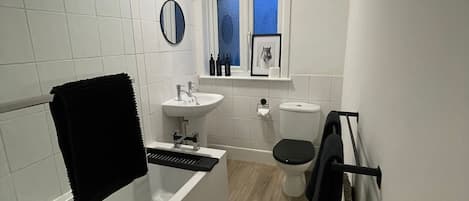 Hair dryer, towels, soap, toilet paper