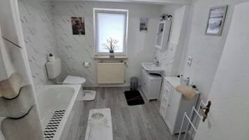 Hair dryer, towels, soap, toilet paper