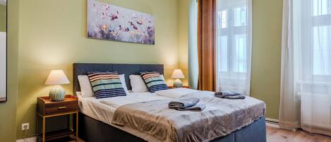 Iron/ironing board, travel crib, free WiFi, bed sheets