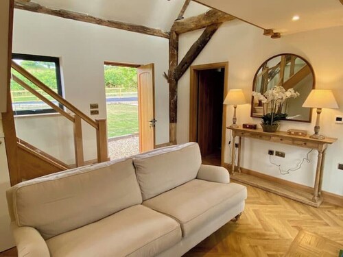 Idyllic listed converted barn with tennis court perfect for families and friends