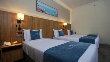 Superior Triple Room | In-room safe, desk, laptop workspace, blackout curtains
