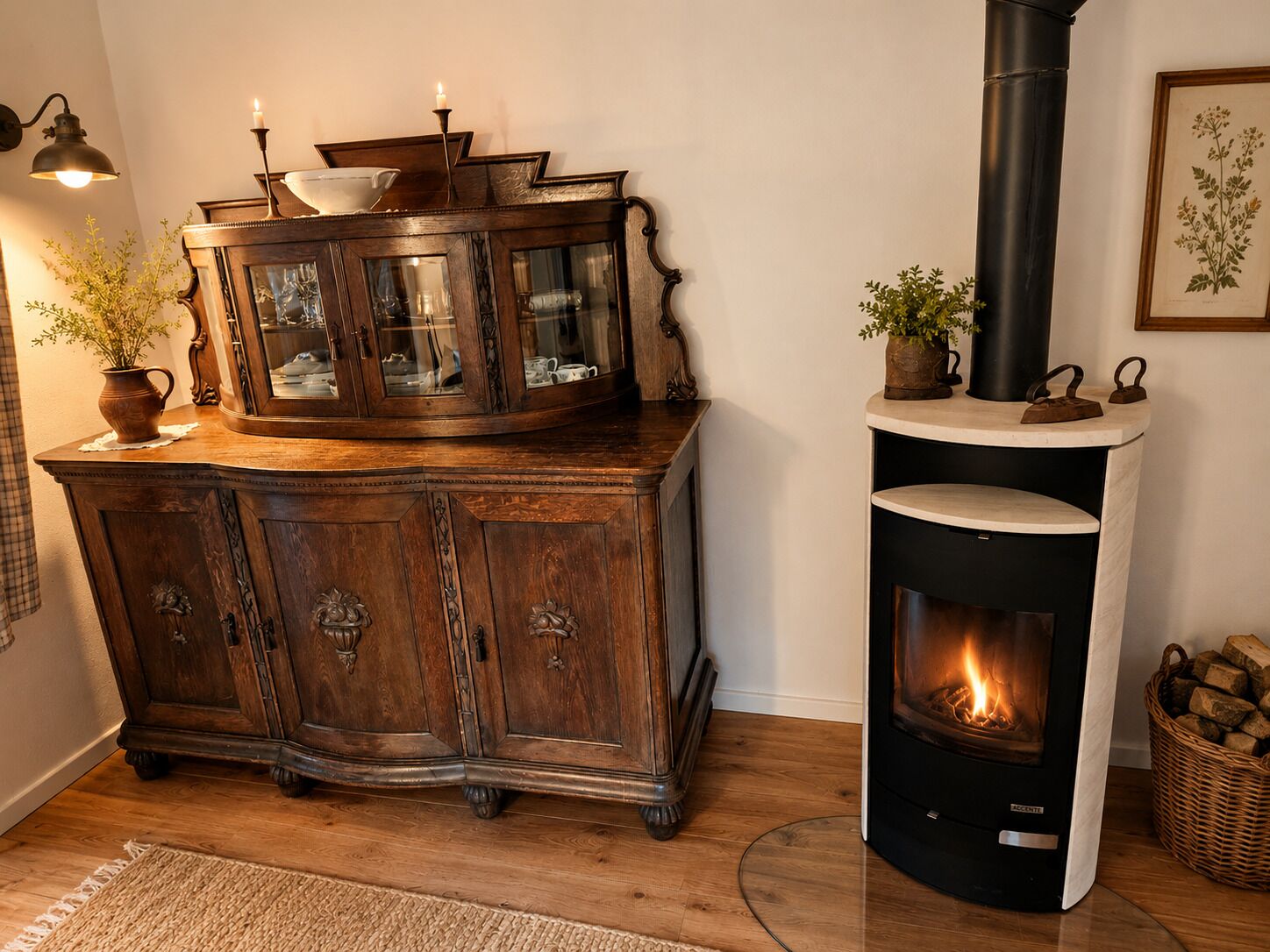 A wooden cabinet with glass doors, a black fireplace with a visible fire, and a wicker basket on the floor.
