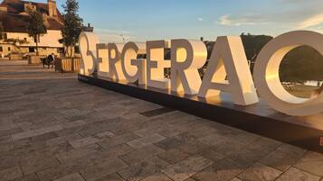 A large outdoor sign with the word 'BERGERAC' in capital letters.