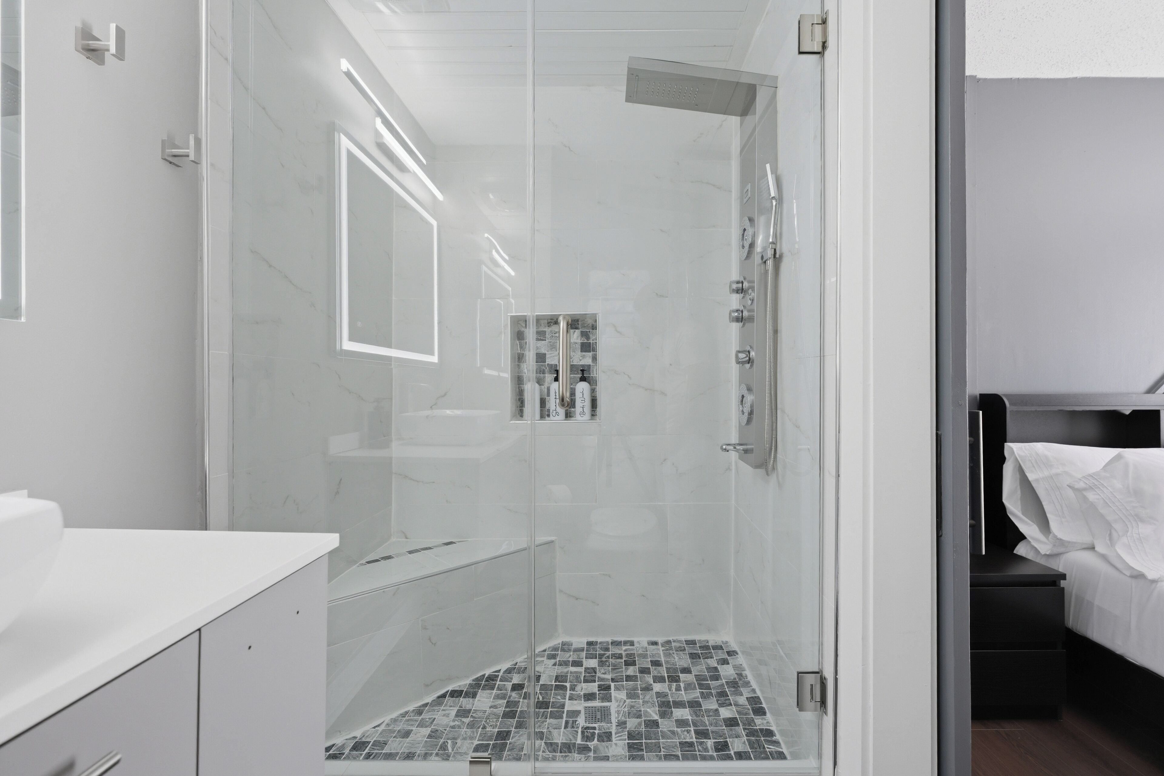 Shower, jetted tub, hair dryer, towels