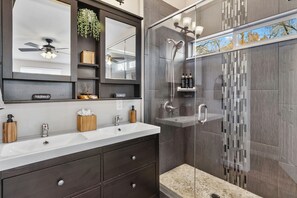 Shower, hair dryer, towels, soap