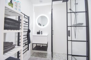 Shower, hair dryer, towels, soap