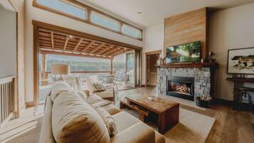 Maison, Plusieurs lits, baignoire à remous, vue sur la montagne (Wilderness Club Home) | Aire de séjour