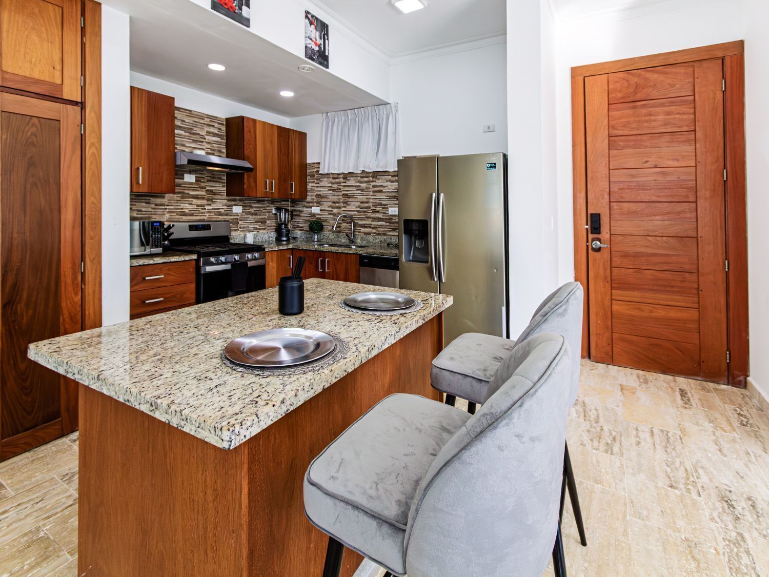 Condo superior, vista para o oceano | Cozinha privada | Geladeira grande, fogão, cooktop, lava-louças