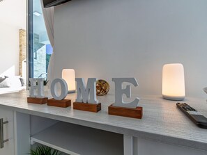 55-inch Smart TV with cable channels, Netflix, streaming services - Grand Laguna Beach Condo J2 (Sosua)