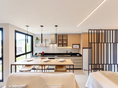 Premium studio apartment with pool, garage, and gym.