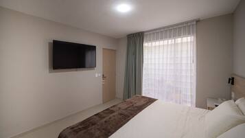 Minibar, in-room safe, desk, laptop workspace