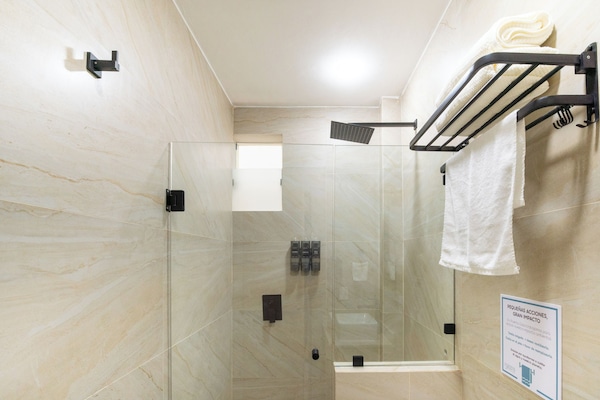 Comfort Room, Patio, Courtyard View | Minibar, in-room safe, desk, laptop workspace