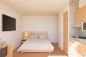 In-room safe, desk, laptop workspace, iron/ironing board