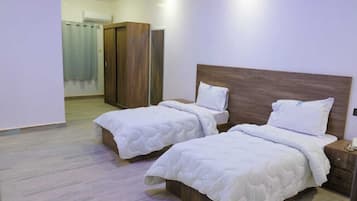 Twin Room, City View | Desk, laptop workspace, iron/ironing board, free WiFi