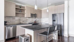 Fridge, dining tables - Landing | Modern 1BD, Pool, Courtyard (Houston)