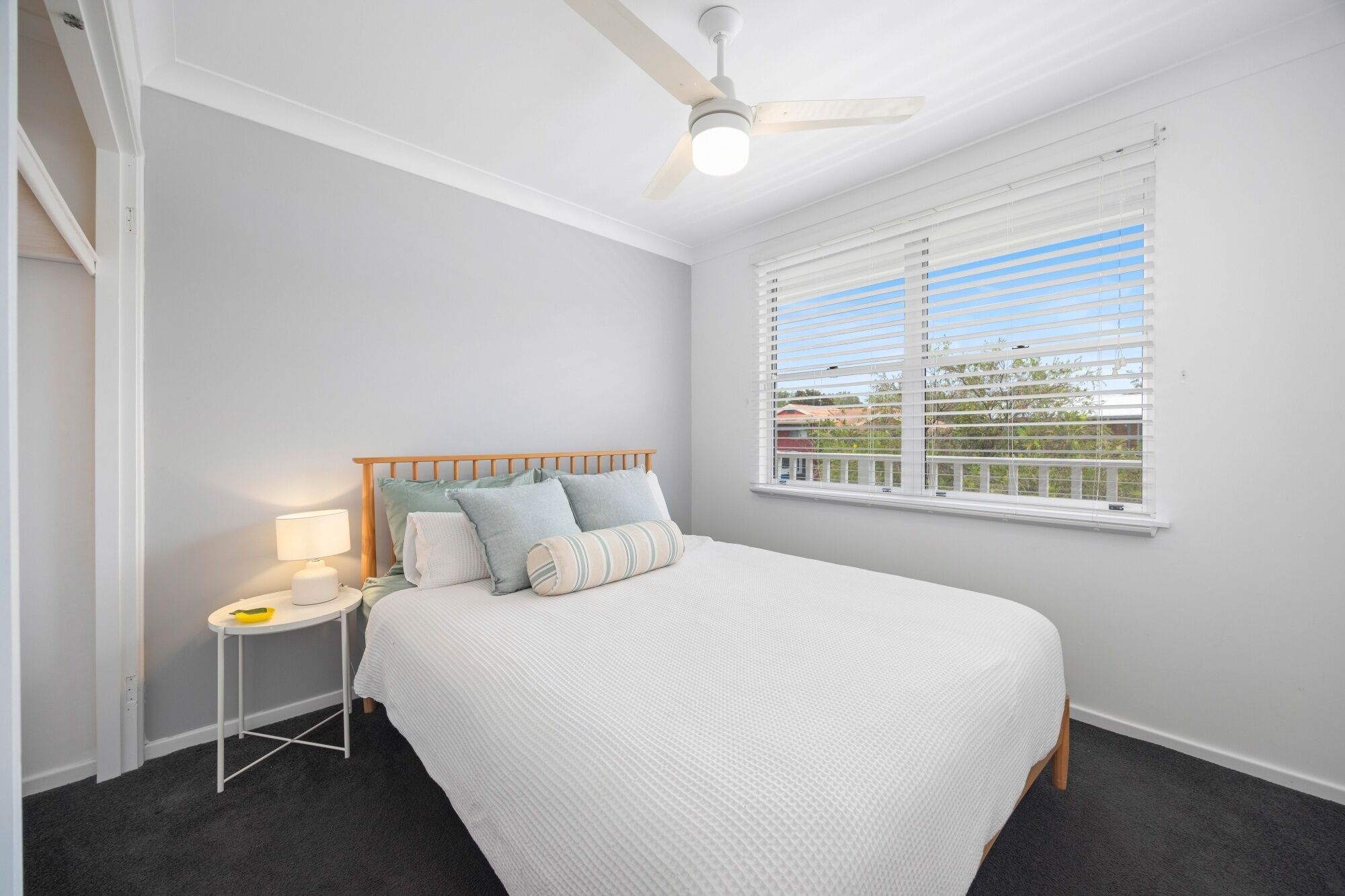 Desk, iron/ironing board, bed sheets