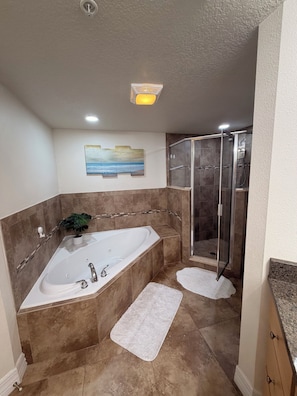 Jetted bath, hair dryer, towels, soap
