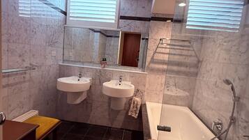Shower, towels, soap, shampoo