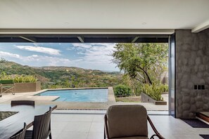 Outdoor pool - Ocean Breezes & Mountain Views — Your Cliffside Escape in La Libertad (El Sunzal)