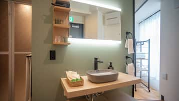 Shower, rainfall showerhead, eco-friendly toiletries, slippers
