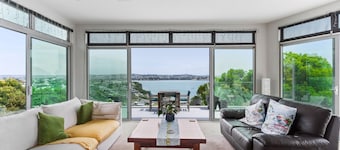 Clifftop Glasshouse with Sweeping Views