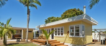 Across the Road from the Sand Classic Kiwi Bach