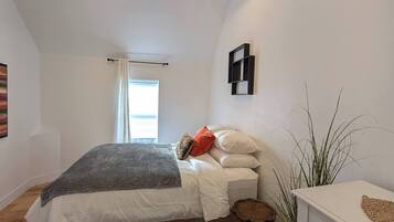 2 dormitorios, tabla de planchar con plancha, wifi y ropa de cama